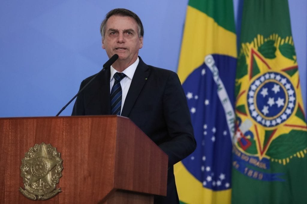 Talvez pegue uma 'cana' aqui no Brasil, diz Bolsonaro sobre Greenwald